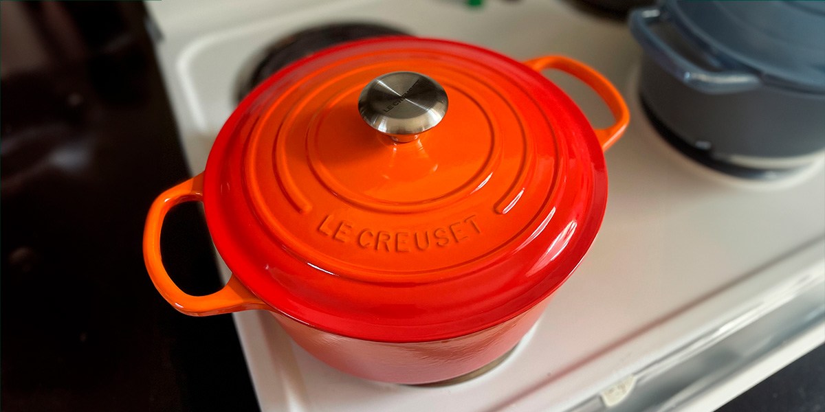 Le Creuset Signature Round Dutch Oven on stove burner Le Creuset Signature Round Dutch Oven on stove burner