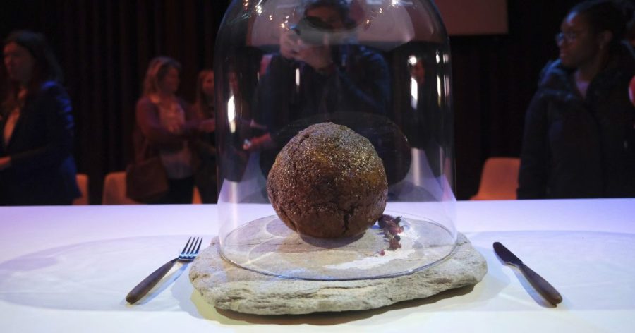 A meatball made using genetic code from a mammoth is seen at the Nemo science museum in Amsterdam, Tuesday March 28, 2023. An Australian company has lifted the glass cloche on a meatball made of lab-grown cultured meat using the genetic sequence from the long-extinct mastodon. The high-tech treat isn't available to eat yet - the startup says it is meant to fire up public debate about cultivated meat. (AP Photo/Mike Corder)