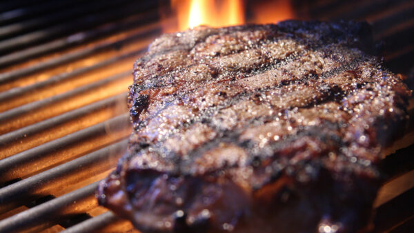 grilled beef steak flame