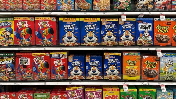 kellogg's cereal boxes on shelves