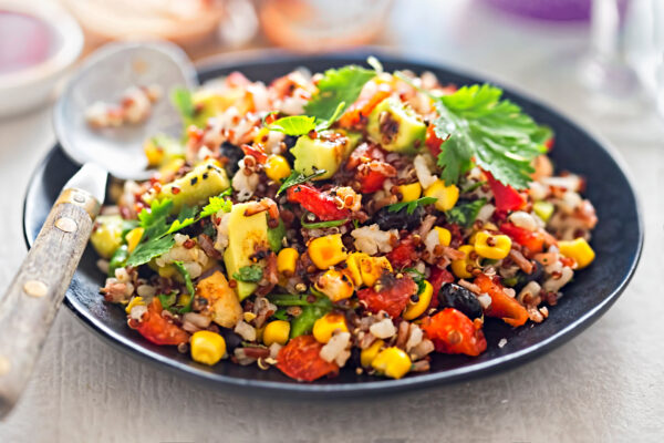 Black beans, avocado, corn, tomato, rice and quinoa salad with chilli dressing.