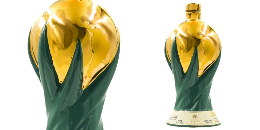 Adictivo tequila World Cup bottle green and gold 