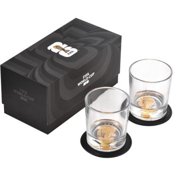 Set of whiskey glasses with black storage box on white background