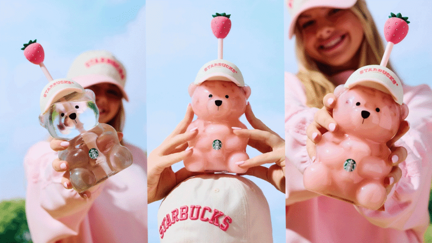 A blonde woman holding Starbucks pink Bearista cup