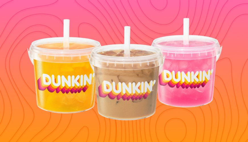 Dunkin Beverage Buckets with various drinks on pink background