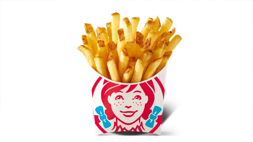 A carton of golden French fries in a branded Wendy's container against a plain white background.