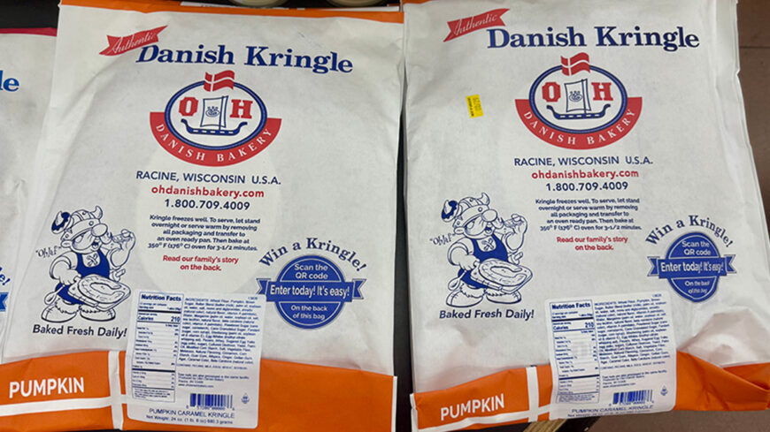 Two packages of O&H Danish Bakery Pumpkin Caramel Kringle are displayed side by side, with white packaging and orange accents.