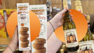 Trader Joe’s pumpkin spice Joe-Joe’s sandwich cookies and pumpkin spice Chardonnay displayed in a store.