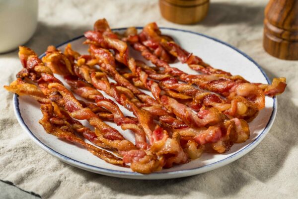 Homemade Trendy Twisted Bacon Strips on a Plate