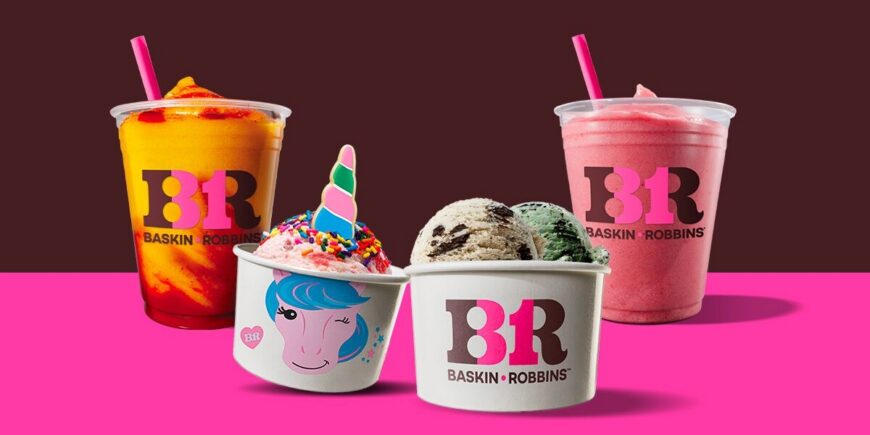 Baskin-Robbins ice cream and frozen drinks, featuring two colorful smoothies and two cups of ice cream, including a unicorn-themed cup with rainbow sprinkles, against a pink and burgundy background.