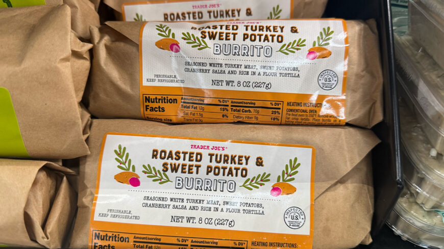 Trader Joe’s Roasted Turkey & Sweet Potato Burritos displayed in a refrigerated grocery case.