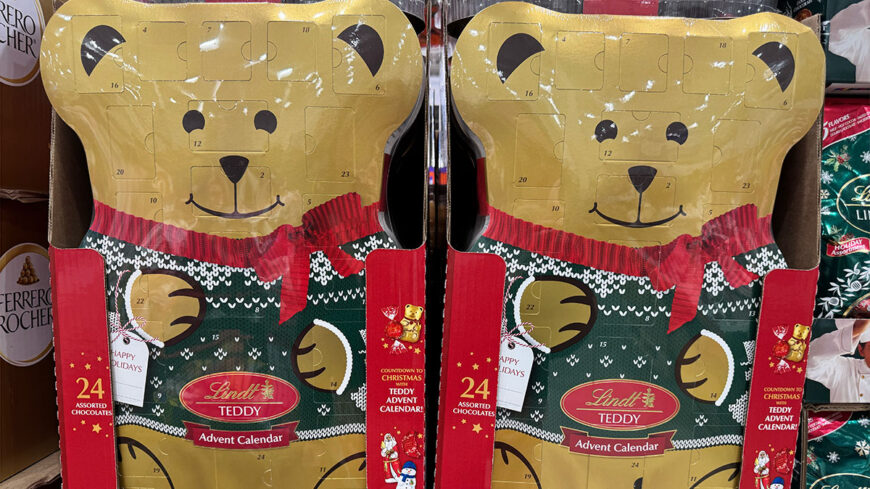 Two Lindt Teddy Advent Calendar packages shaped like teddy bears, each containing 24 assorted chocolates.